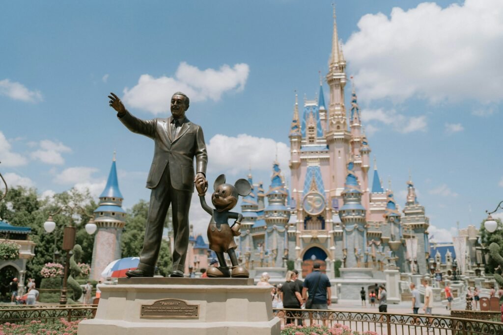 The "Partners" statue of Walt Disney and Mickey Mouse in front of Cinderella's Castle at Magic Kingdom in Orlando, Florida.